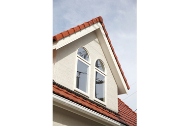 三角屋根のあたたかな家。外観3