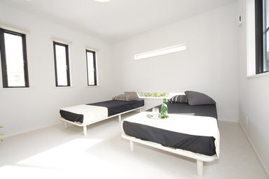 リビングフロアを中心に、家族の声がこだまする住まい-MultiLayerd 寝室